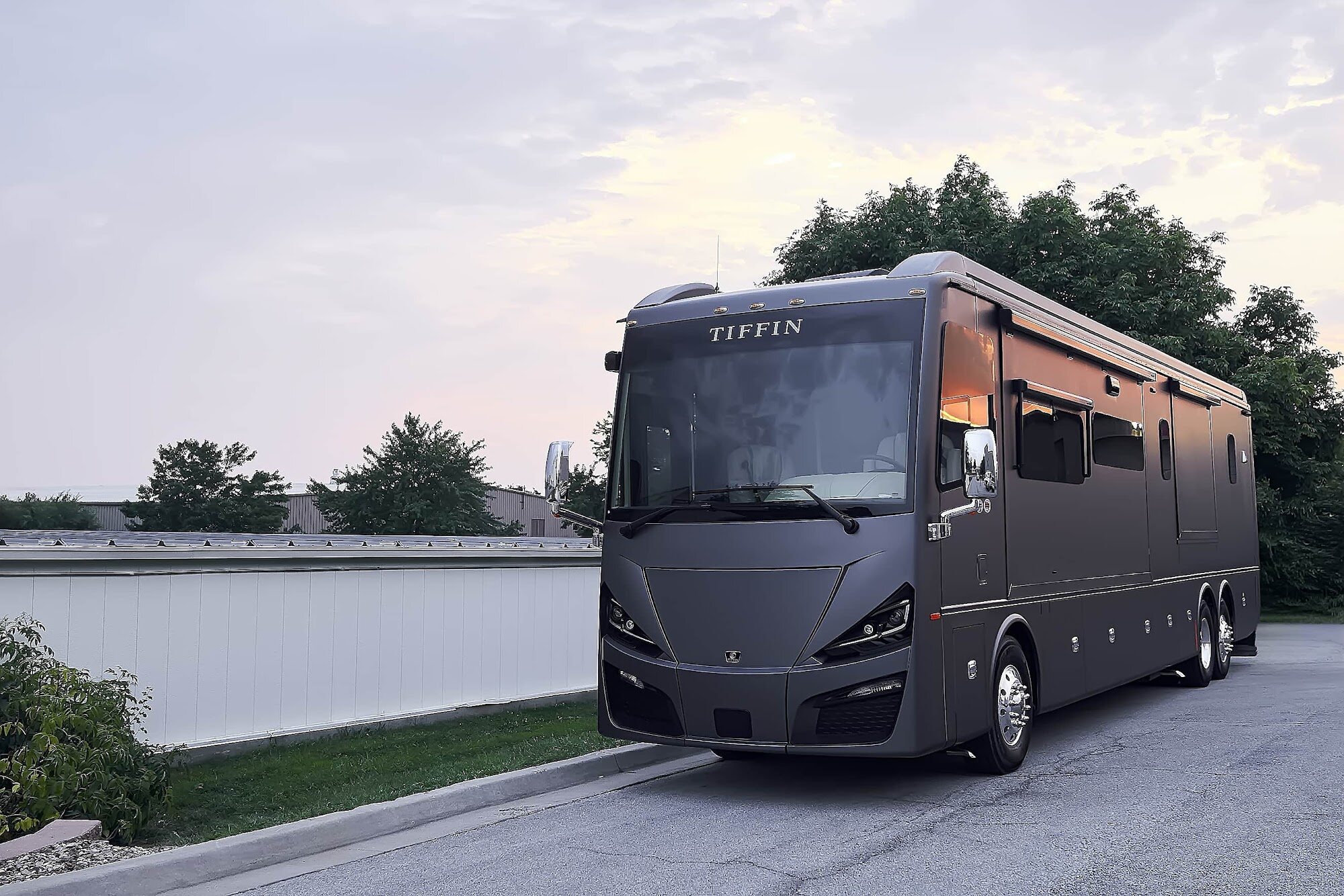 Wide front three-quarter view of the completed Tiffin motorcoach wrap (project photo 209)