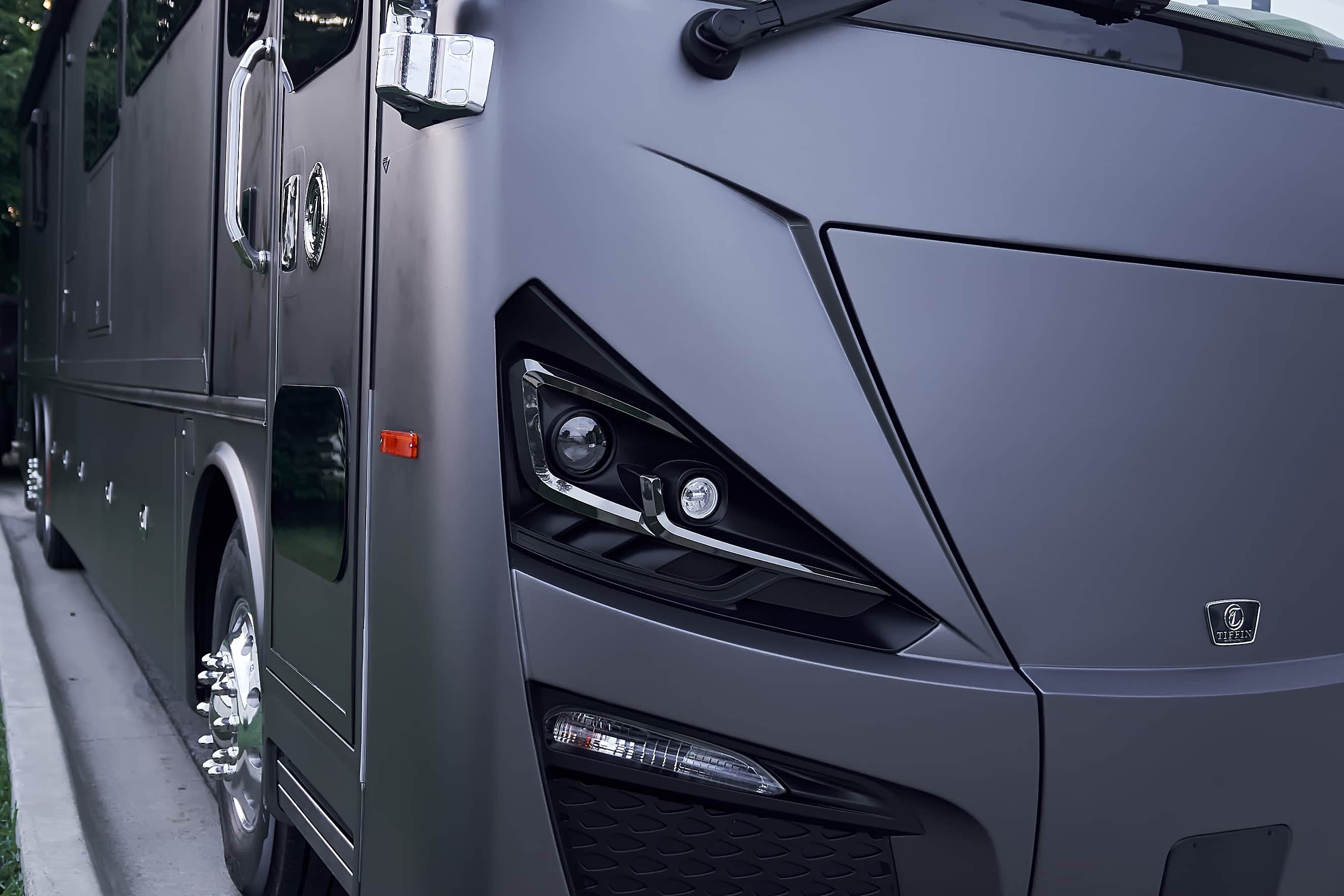 Medium front-corner view of the completed Tiffin motorcoach wrap (project photo 215)