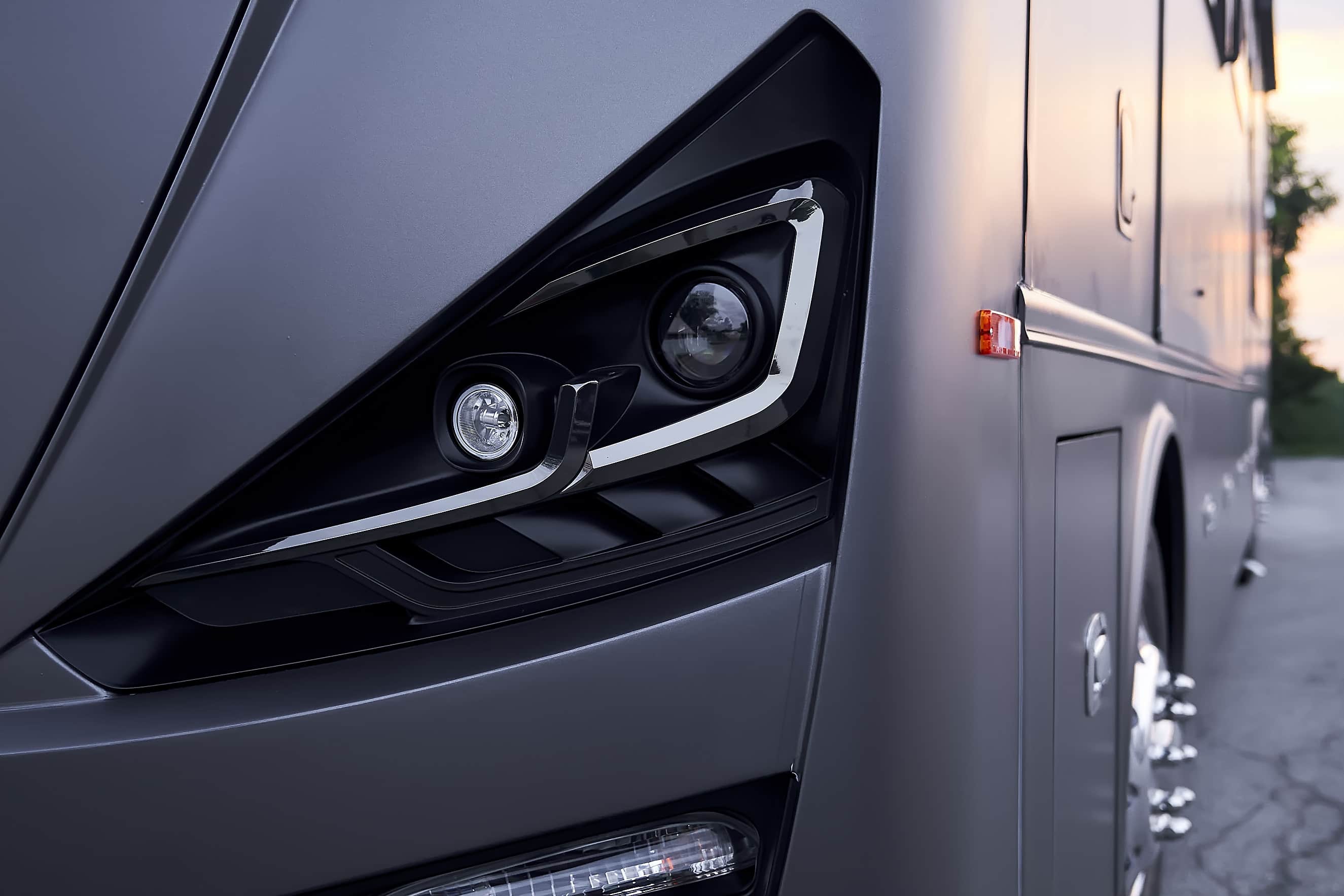 Close-up of the wrapped motorcoach headlight surround (project photo 202)